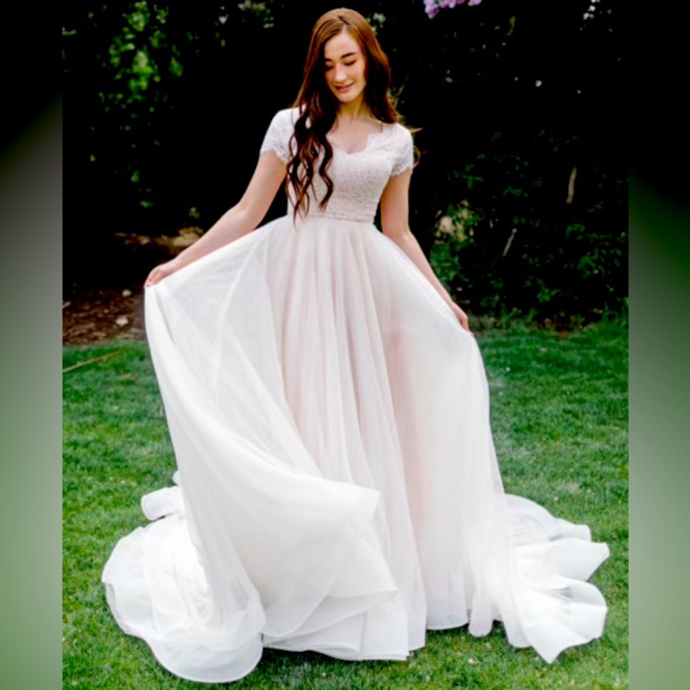 Never worn and tried on once. Paid $1250 and looking for $700OBO.